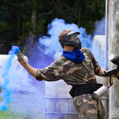 1 Blue smoke surrounding a player about to throw a pyro